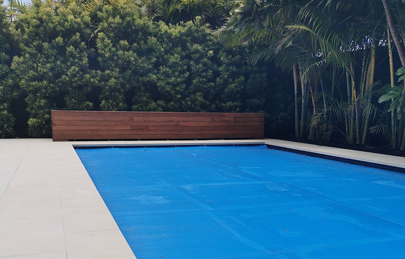 A Manual Concealed Pool Cover Roller Can Make Stylish Seating