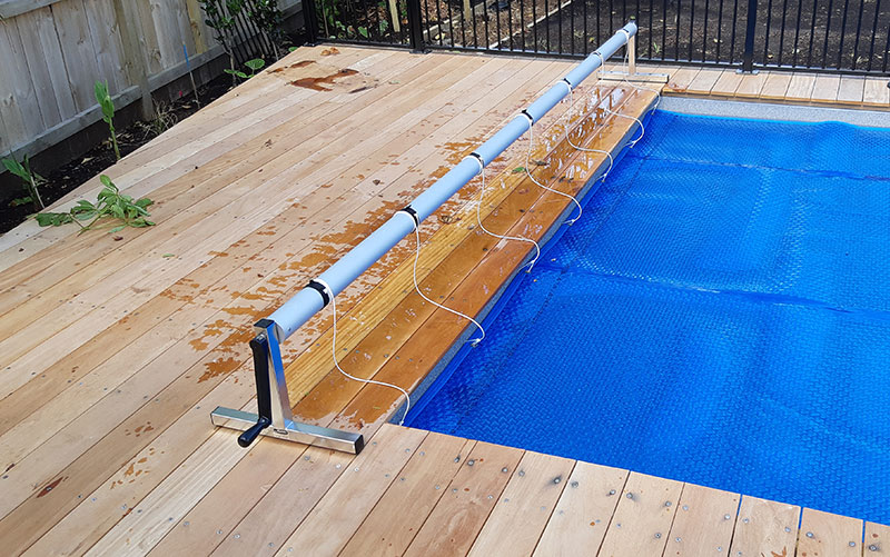 A Pool Cover Reel Makes Rolling Your Cover On And Off Your Pool Easy.